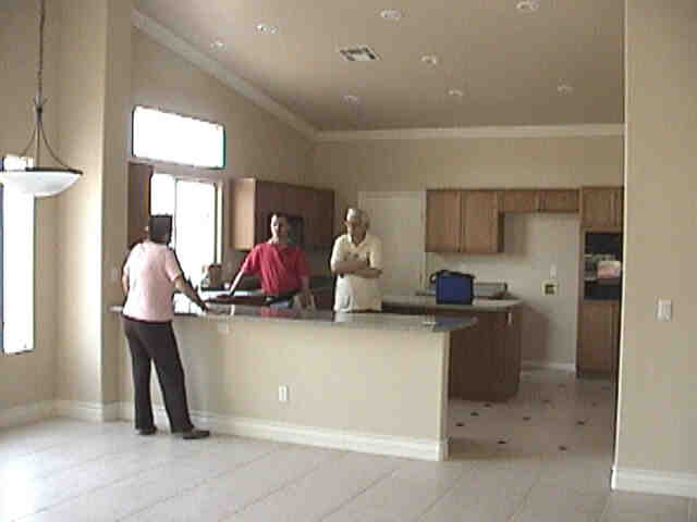 Gram, Ed, and Randy in kitchen,